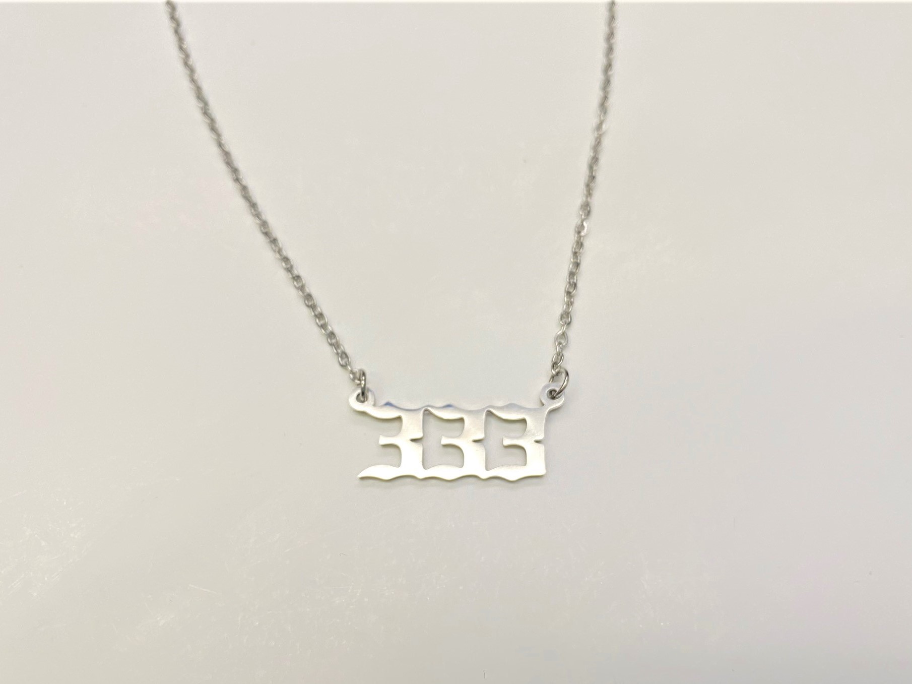 What Does the 333 Necklace Mean? Exploring the Symbolism Behind Angel Number 333 1 What Does the 333 Necklace Mean? Exploring the Symbolism Behind Angel Number 333